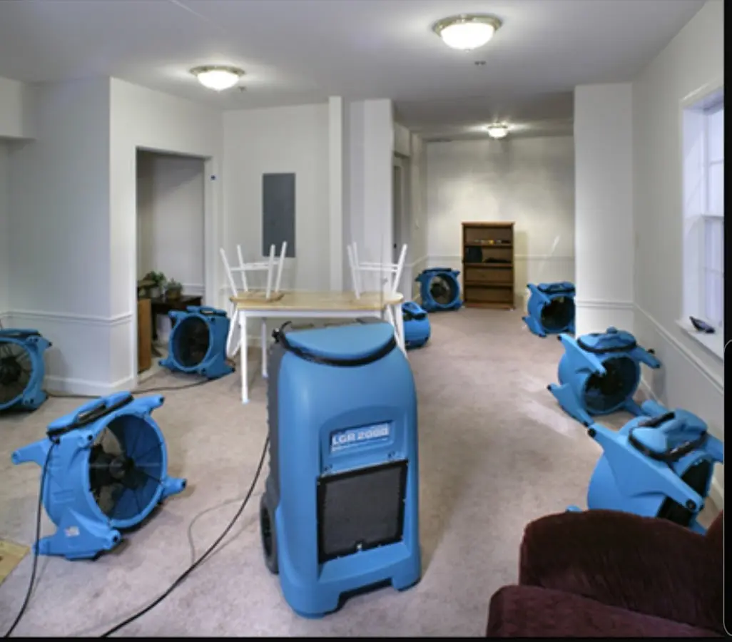 Air movers and dehumidifier setup for Water Damage Restoration in White Center